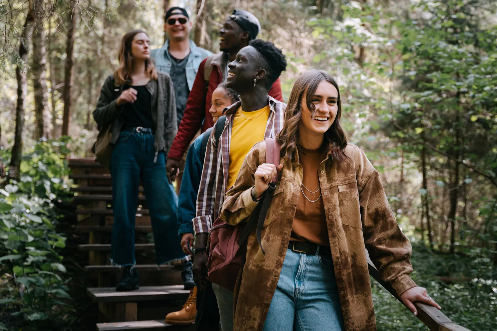 Friends hiking together through nature
